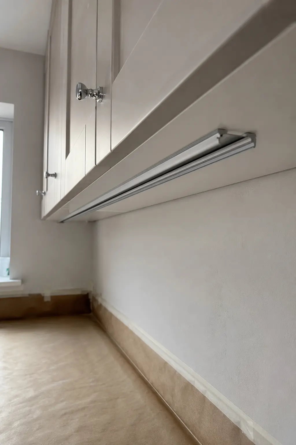 Finished under-cabinet lighting installed by an electrician